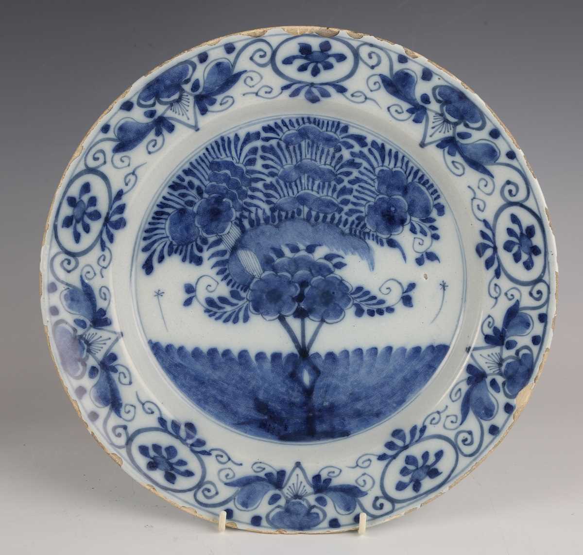 A set of four Dutch delft plates, late18th/19th century, each painted in blue with a central 'tea - Image 7 of 19
