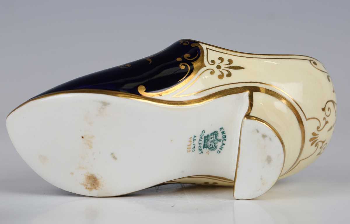 Two Coalport porcelain models of slippers or shoes, early 20th century, the first painted with a - Image 9 of 10
