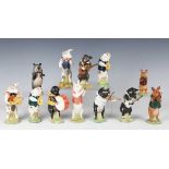 Twelve Beswick Pig Promenade figures, comprising two limited edition examples produced for