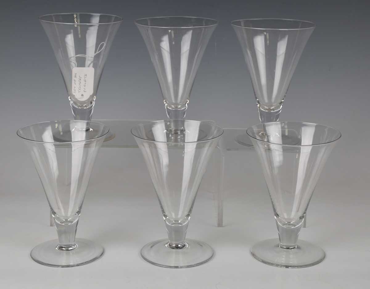 A set of seven hollow stem wine glasses, late 19th/early 20th century, the rounded funnel bowls - Image 5 of 5