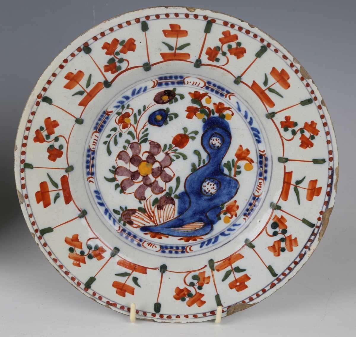 A Dutch delft Peacock pattern plate by De Porceleyne Claeuw, 18th century, painted in blue within an - Image 5 of 8