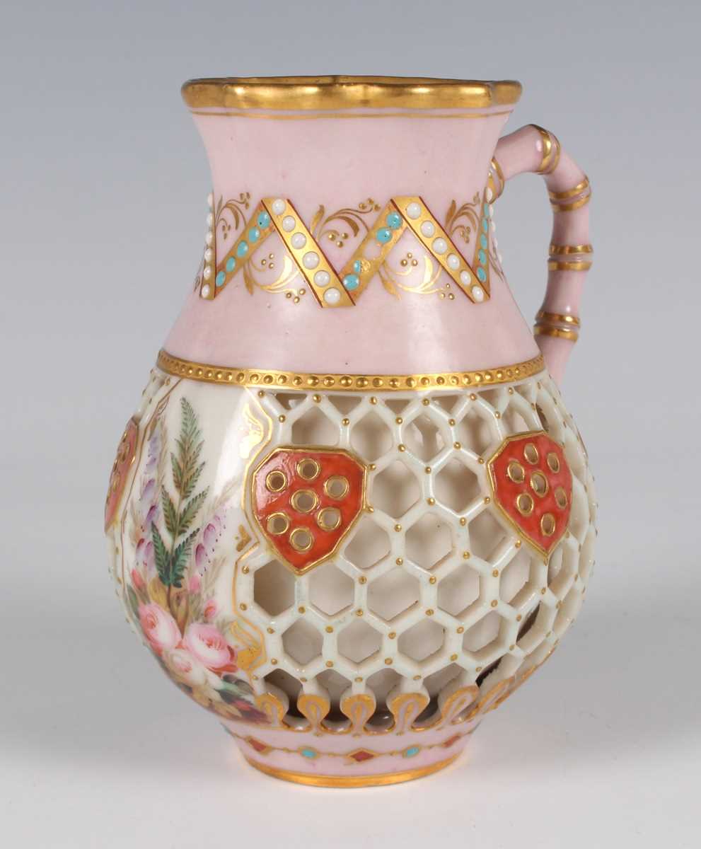 A Royal Worcester reticulated jug, dated 1875, the double-walled body pierced with a honeycomb