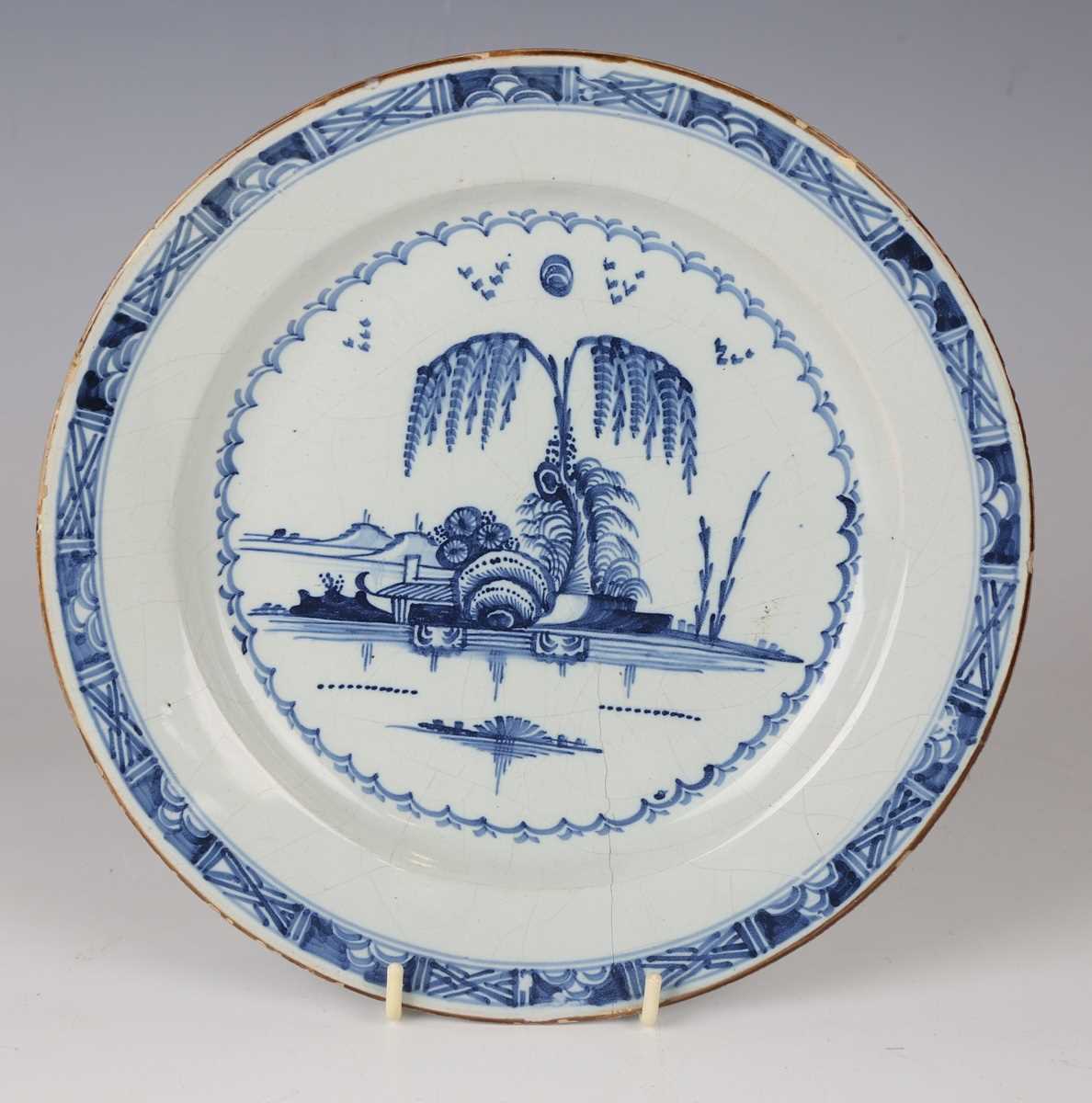 A matched pair of English delft plates, probably London, 1780s, painted in blue with a chinoiserie - Image 6 of 7