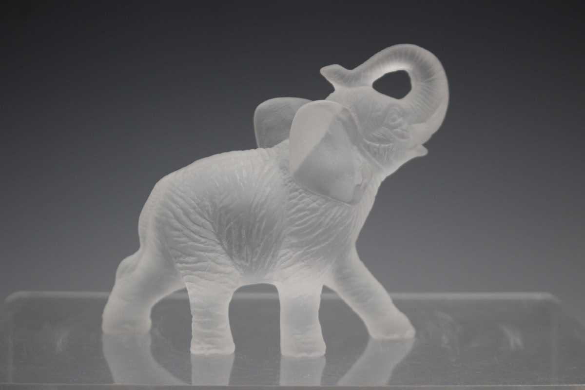 A Daum frosted amber glass model of an elephant with raised trunk, contemporary, designed by Jean- - Image 6 of 7