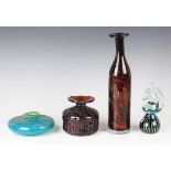 A Mdina tortoiseshell moulded glass vase, engraved mark to base, height 12cm, a similar bottle vase,