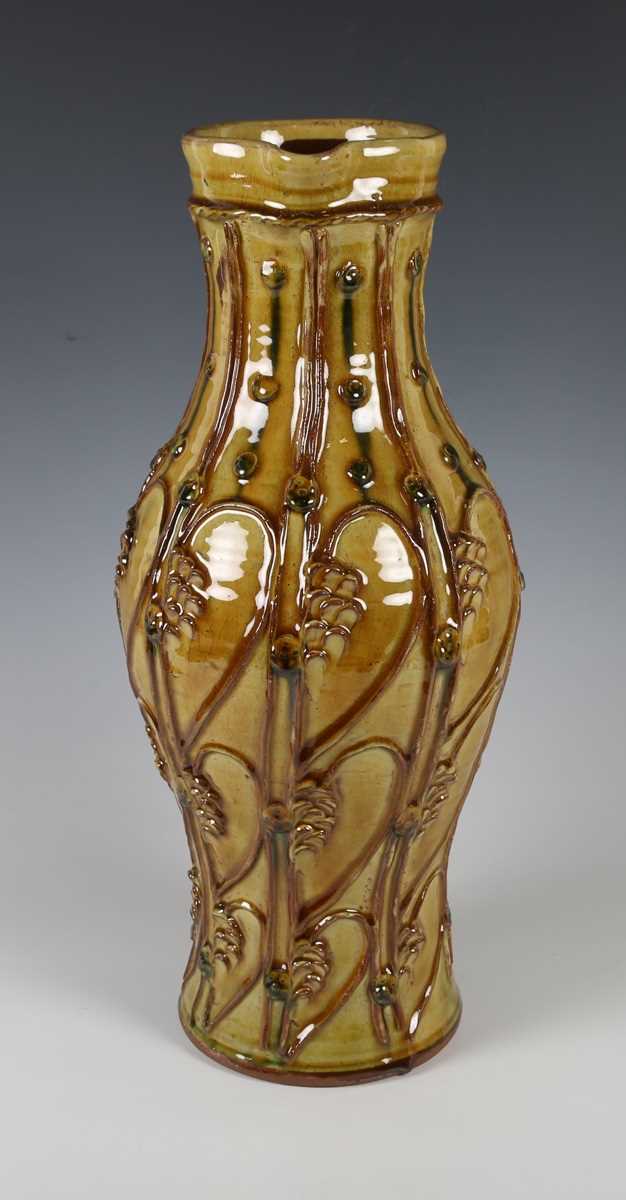 A large Doug Fitch studio pottery jug, the ochre glazed pear shaped body with appliqué medieval - Image 2 of 6