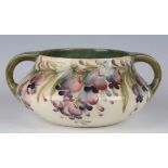 A Macintyre Moorcroft Wisteria pattern two-handled circular bowl, circa 1912-14, with cream ground