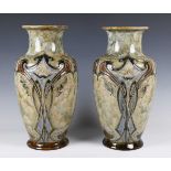 A large pair of Royal Doulton stoneware vases, decorated by Eliza Simmance, monogrammed, with tall