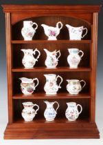 A set of twelve Royal Worcester Historic Jugs Collection jugs, each replicating an original 18th
