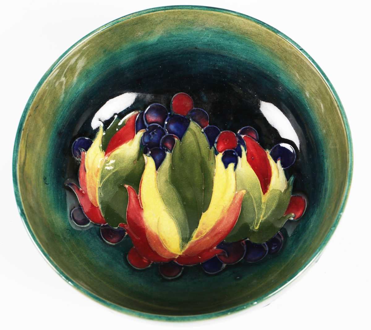 A Moorcroft Leaf and Berry pattern circular bowl, circa 1940, with shaded blue to green ground, - Image 5 of 7
