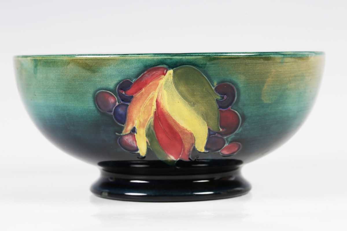 A Moorcroft Leaf and Berry pattern circular bowl, circa 1940, with shaded blue to green ground, - Image 3 of 7