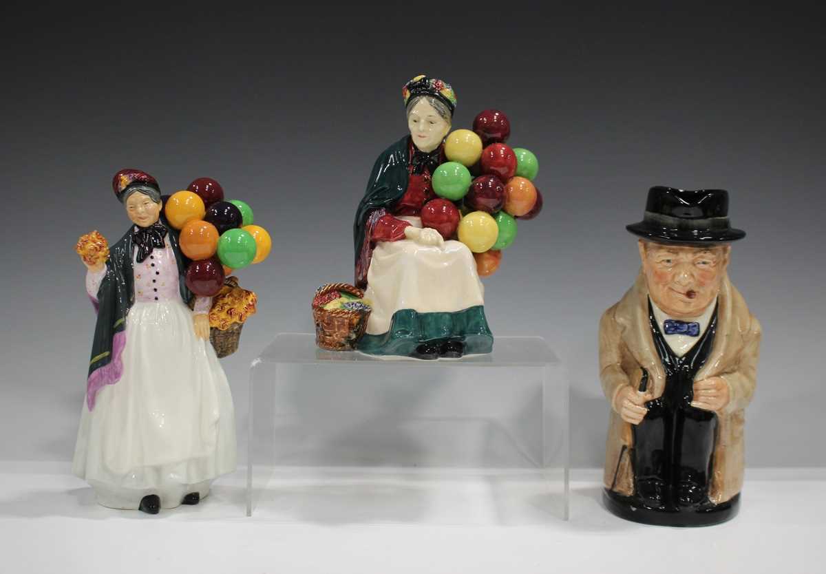 Two Royal Doulton figures, comprising Biddy Pennyfarthing, HN1843, and The Old Balloon Seller,