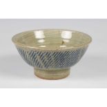 A small William Plumptre studio pottery Japanese style footed bowl, ash glazed to the interior and