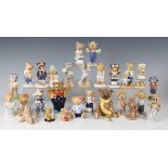 Twenty-one Bing & Grondahl The Teddy Bear Collection figures, including three limited edition