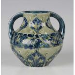 A Liberty Moorcroft Florian Ware two-handled diminutive vase, circa 1900, with enclosed panels of