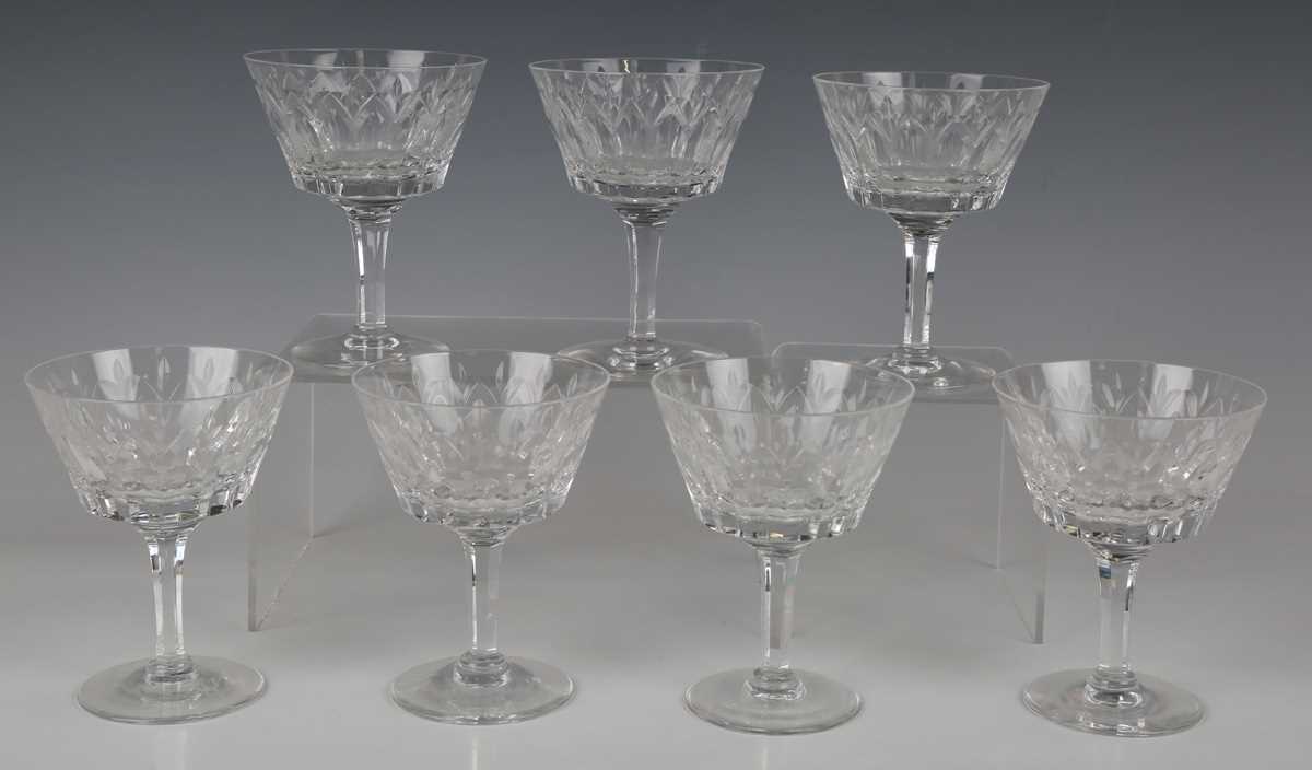 A set of seven hollow stem wine glasses, late 19th/early 20th century, the rounded funnel bowls - Image 2 of 5