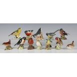 Eleven small Beswick bird models, including Bullfinch, Wren, Blue Tit and Goldfinch.