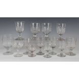 A large mixed group of drinking glasses, 19th century and later, including a pair of rummers with