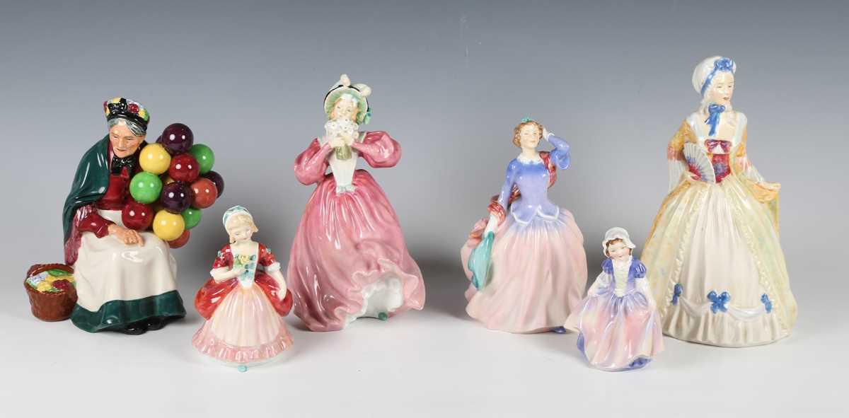 Six Royal Doulton figures, comprising Mrs Fitzherbert, HN2007, The Old Balloon Seller, HN1315,