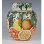 A Moorcroft Florida pattern ginger jar and cover, dated 2000, designed by Jeanne McDougall, black