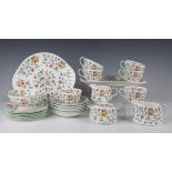 A small group of Minton Haddon Hall pattern wares, comprising cake plate, rectangular sandwich tray,