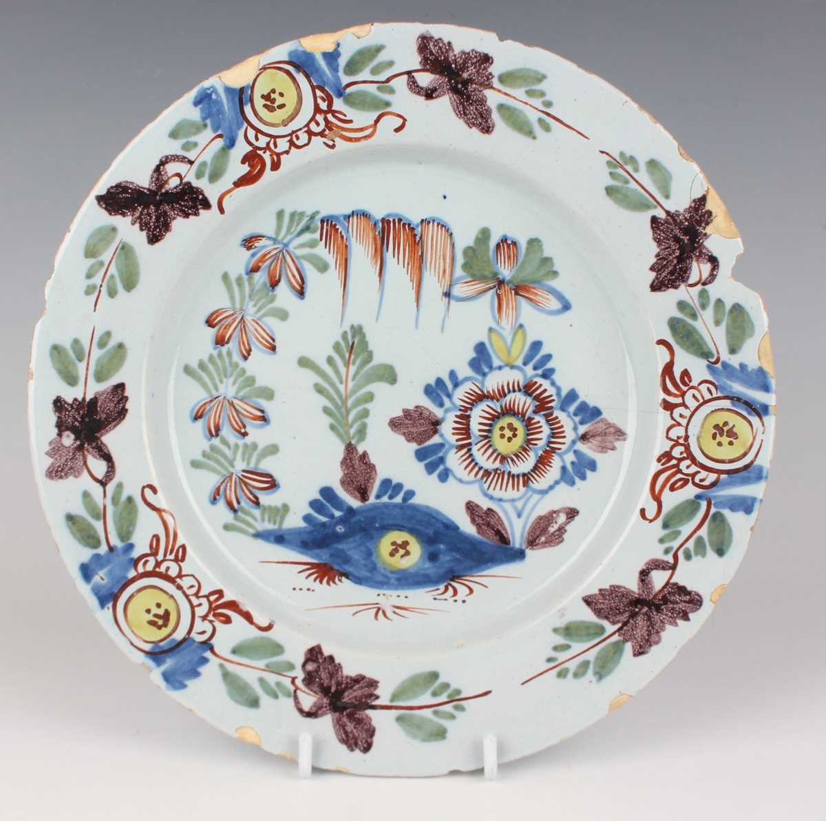 An English delft plate, Lambeth, circa 1770-85, painted in blue, green and manganese with a windmill - Image 7 of 23