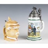 A German porcelain stein, modelled as the head of Otto von Bismarck, the hinged lid in the form of a