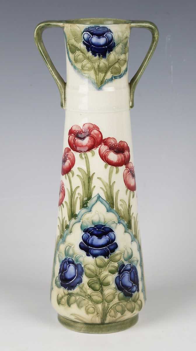 A Macintyre Moorcroft two-handled vase, circa 1908-09, the cream ground with pinkish red poppies