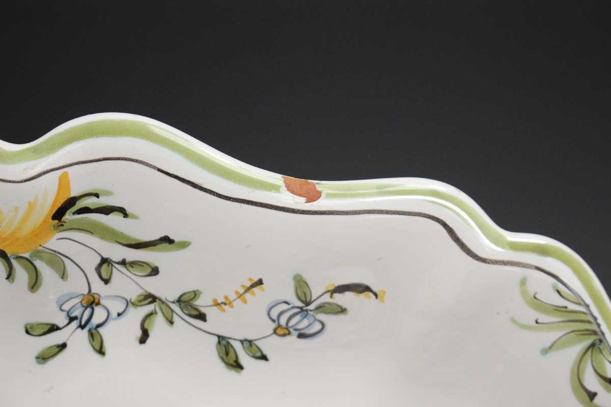 A Moustiers French faience part service, 20th century, painted with an exotic bird amidst flowers - Image 9 of 12