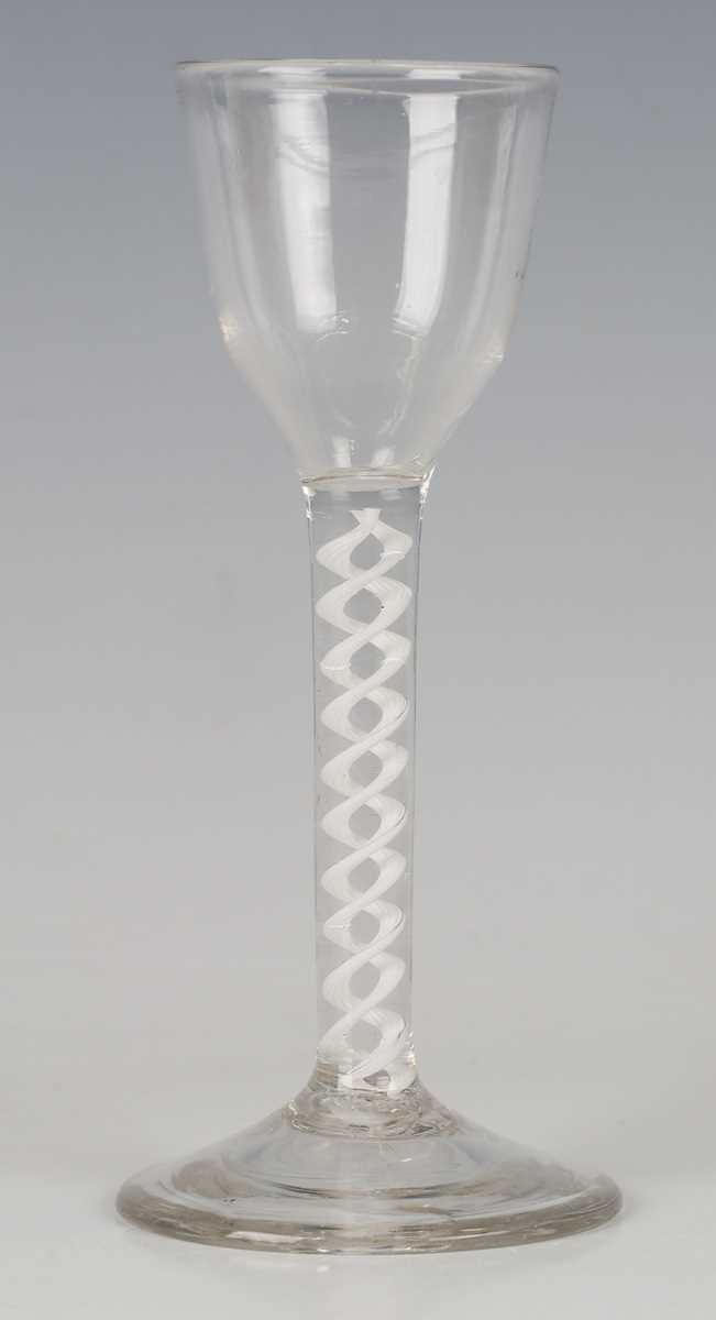 A pan-topped plain stem wine glass, circa 1740, with domed foot, height 16cm, together with two - Image 4 of 7