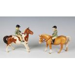 A Beswick Girl on Pony, with skewbald horse, model No. 1499, and a Beswick Boy on Pony, with