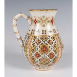 A Royal Worcester reticulated jug, dated 1875, the double-walled body pierced with an aesthetic