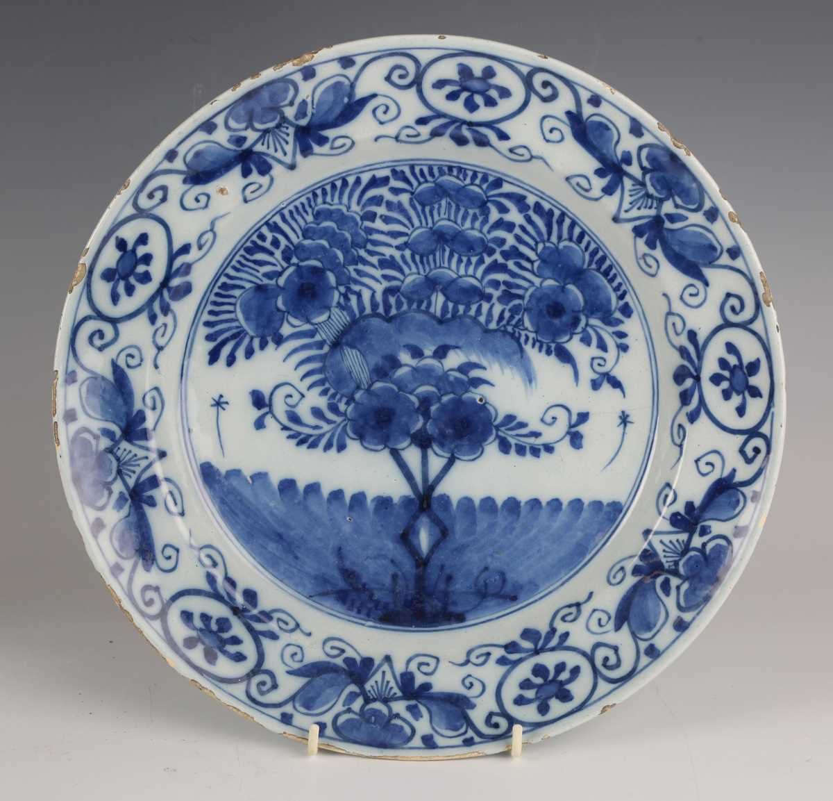 A set of four Dutch delft plates, late18th/19th century, each painted in blue with a central 'tea - Image 5 of 19