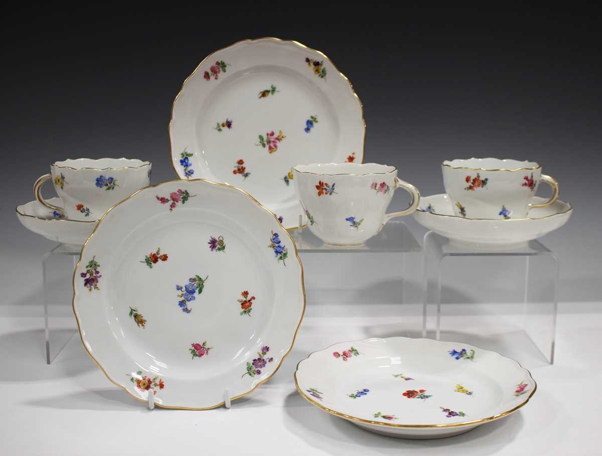 A small group of Meissen teawares, 20th century, painted with scattered flowers, comprising three - Image 2 of 8