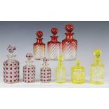 A graduated set of three Baccarat amberina glass scent bottles and stoppers, early 20th century,