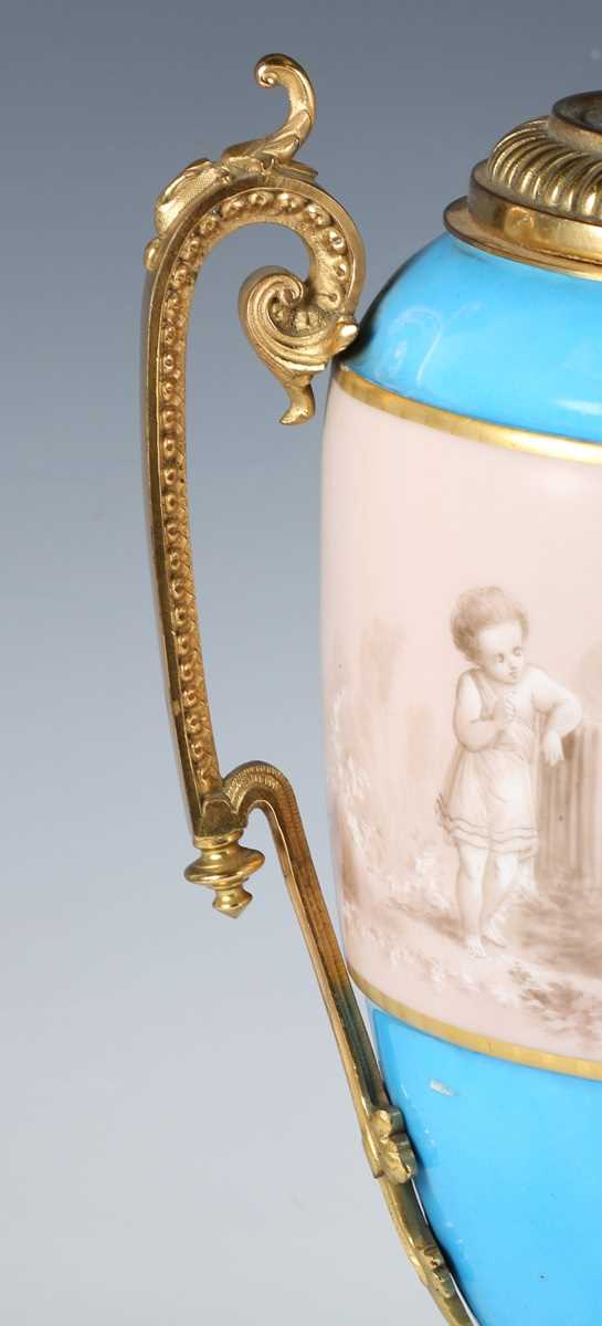 A pair of Sèvres style ormolu mounted porcelain lampbases, circa 1900, both painted with a sepia - Image 6 of 8