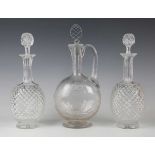 A pair of decanters and stoppers, early 20th century, each with an overall strawberry diamond