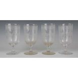 A set of four engraved glass goblets, Stourbridge, late 19th century, each generous funnel bowl