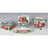 Four pieces of Wemyss pottery painted with pink cabbage roses, circa 1900 and early 20th century,