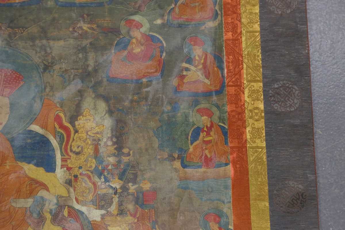 A Tibetan silk mounted hanging thangka, painted on fabric depicting the 6th Shamarpa, Mipan Chokyi - Image 7 of 16