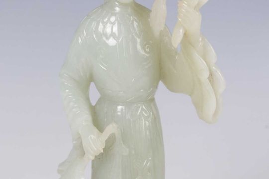 A Chinese carved pale celadon jade figure of a maiden, 20th century, modelled holding a flower - Image 3 of 16