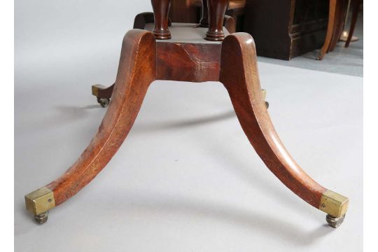 A Regency mahogany single pedestal Pembroke table, the four downswept legs terminating in brass caps - Image 7 of 9