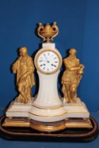 A good quality 19th century French mantel clock with circular enamelled dial in gilt mounted white