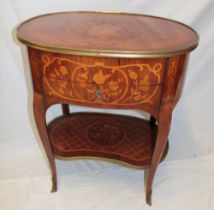 A good quality French inlaid mahogany oval centre table with a single frieze drawer and long side