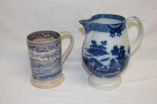 A George III pottery tapered jug with "Buffalo" blue and white decoration (slight damage) 8 1/2"
