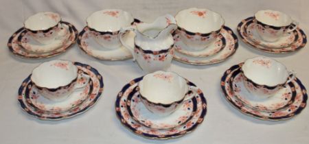 A Crown Derby "Yeadon" pattern part tea set with floral borders comprising five tea cups,