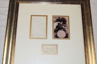 A framed display relating to professional drummer Peter Sellers (died 1980) including a signed card,