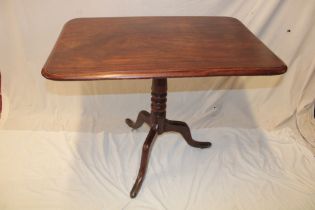 A 19th century mahogany rectangular snap-top occasional table on turned column with tripod base