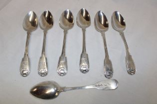Seven matching George III silver fiddle pattern tea spoons with scallop decoration,