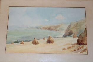 E** M** Horton - watercolour North Cornwall coastal scene with hay ricks,